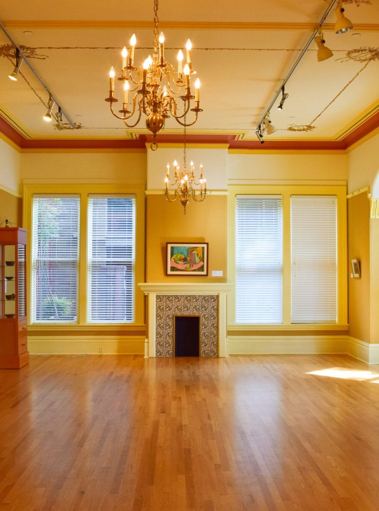 wide-angle-shot-interior-building-including-pictures-chandelier-doors